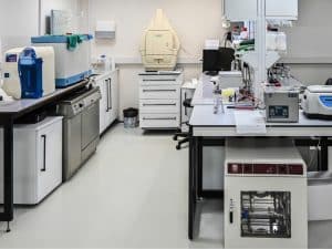 Scientific laboratory featuring a sleek and durable epoxy floor finish. Discover factors influencing its scratch resistance.