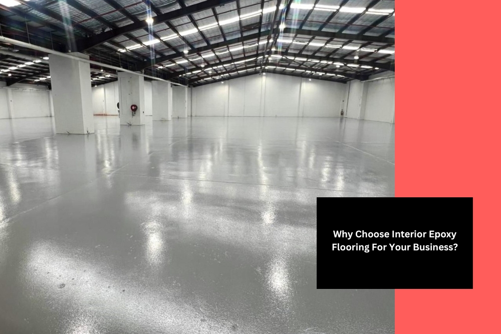 spacious industrial warehouse with smooth grey interior epoxy flooring and high ceilings, offering a durable and polished finish