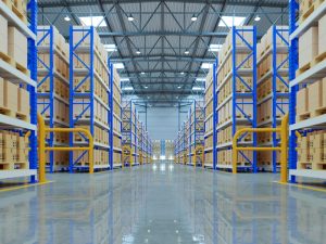 Organised warehouse shelving with epoxy coating on floor, offering durable and polished surface for industrial use.