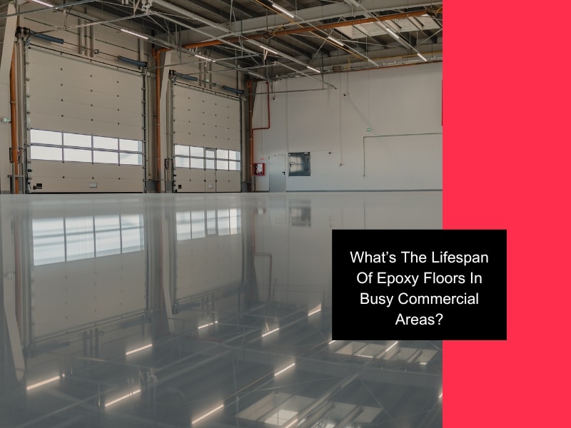 a warehouse with shiny epoxy flooring indicating a good epoxy floor lifespan