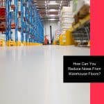 Warehouse floor with shelves, highlighting methods to reduce noise floor and improve work environment in industrial spaces.