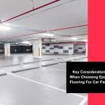 Clean, organised car park flooring with epoxy coating, designated spaces, and modern finish for durability and maintenance ease.