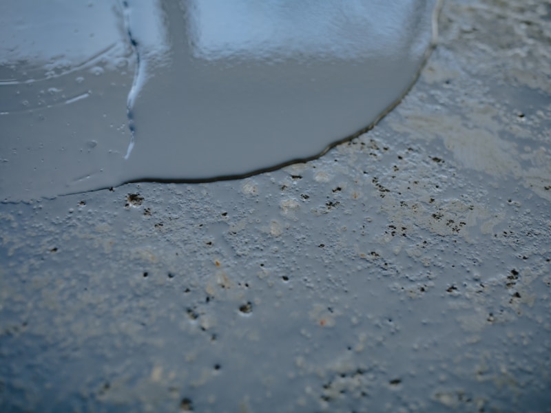 surface flaws visible while putting epoxy on garage floor