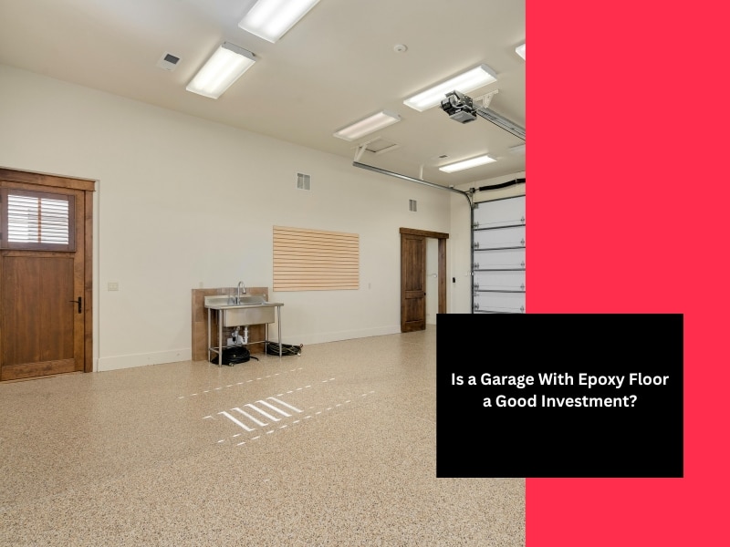 Modern clean garage with epoxy floor and stainless sink setup.